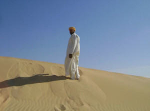 Egypt Holidays Man on Sand Dune